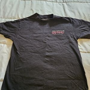 Primitive Black Short-Sleeve Tee with Pink Chest Logo